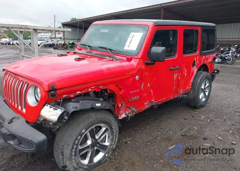 2021 Jeep Wrangler Unlimited Sahara 4X4 из США, поврежденный, VIN 1C4HJXENXMW592247